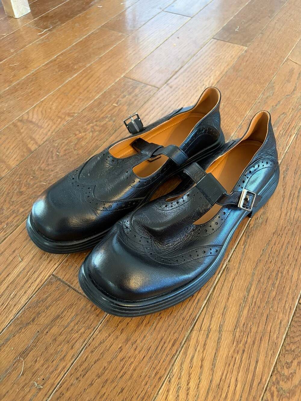 Black Leather T-Strap Mary Jane Shoes with Buckle Detail
